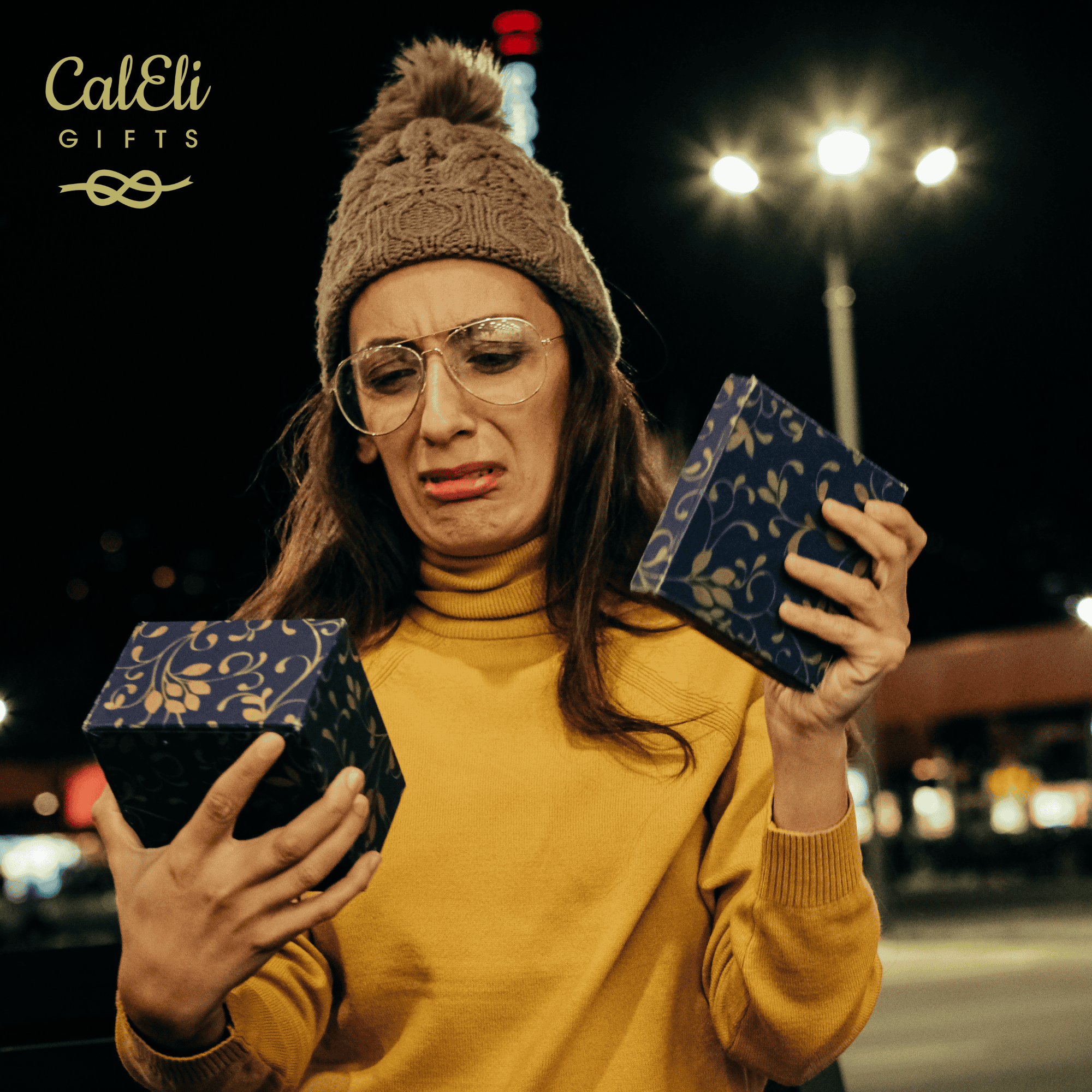 a lady holding a present and looking sad when she has opened it