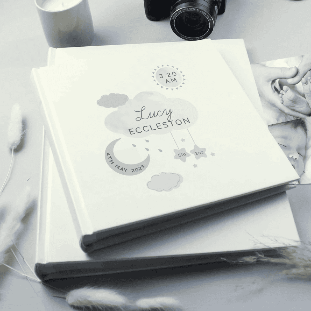 personalised baby photo album with the baby's name, date of birth, birth weight and time of birth on the front cover