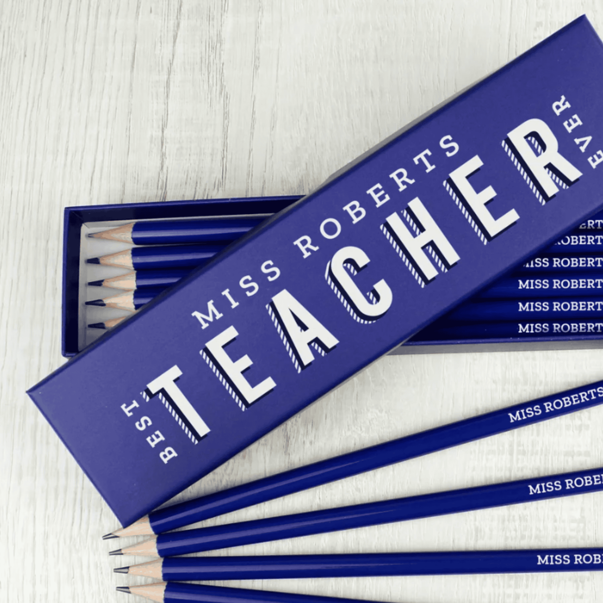 personalised teacher pencil box set with their name on the top of the box and on all the pencils