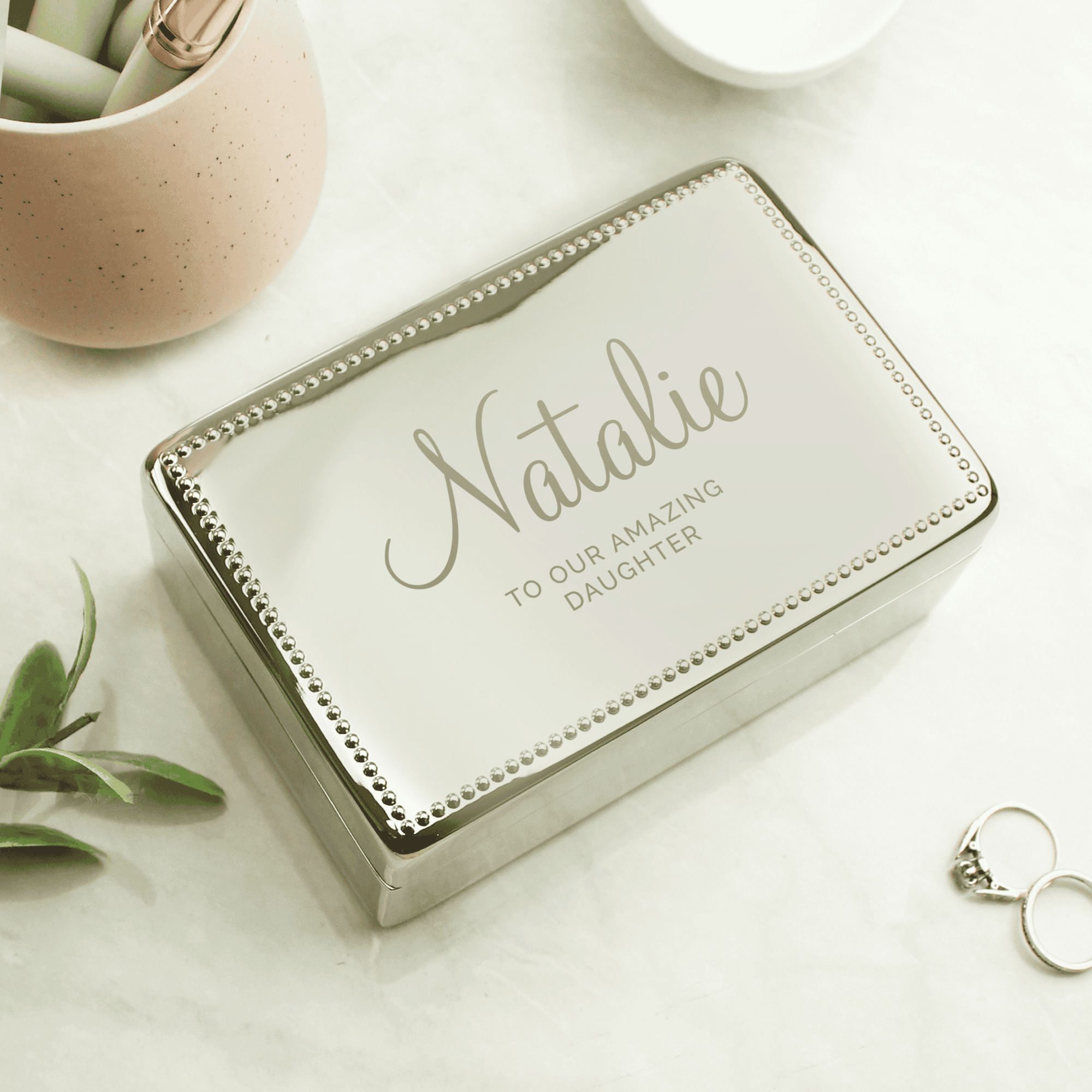 personalised jewellery box with name in large font and message underneath