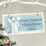 personalised wooden snowman sign showing the names on the front