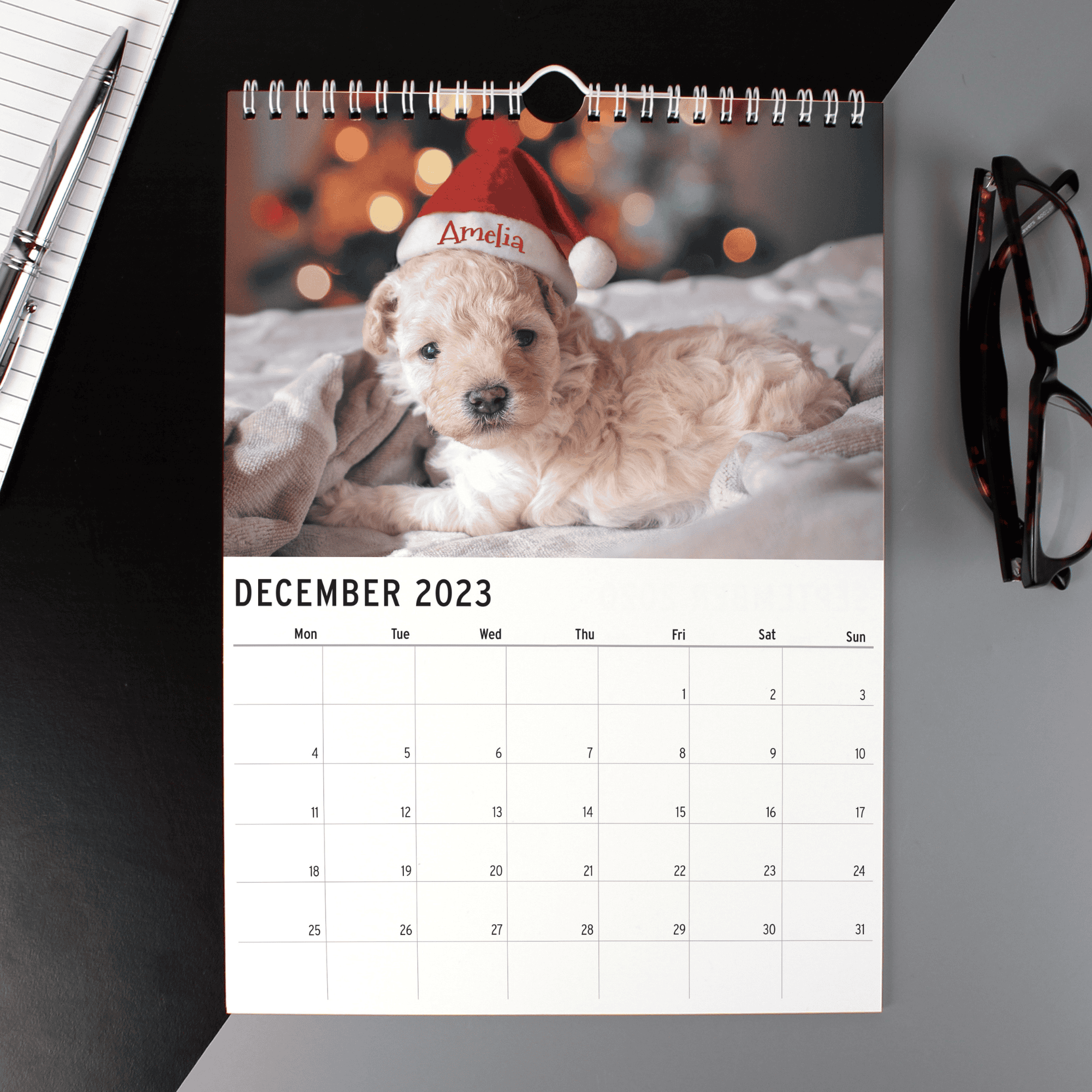 personallised a4 wall calendar of cute animals with the person's name featured in the picture for every month