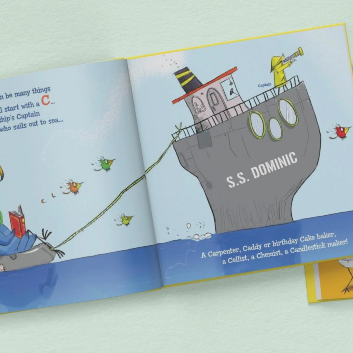 personalised ABC book showing the illustrations inside with the child's name personalised on the pages