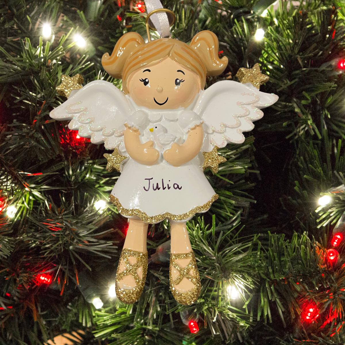 personalised angel christmas tree decoration showing the personlisation on the dress