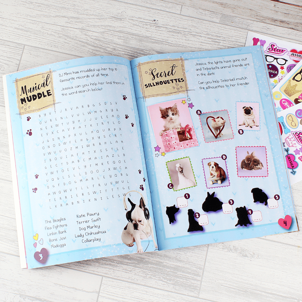 personalised activity sticker book showing examples of the inside pages