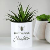 personalised bee-utiful ceramic storage pot with a bee on the front and any name personalised on it