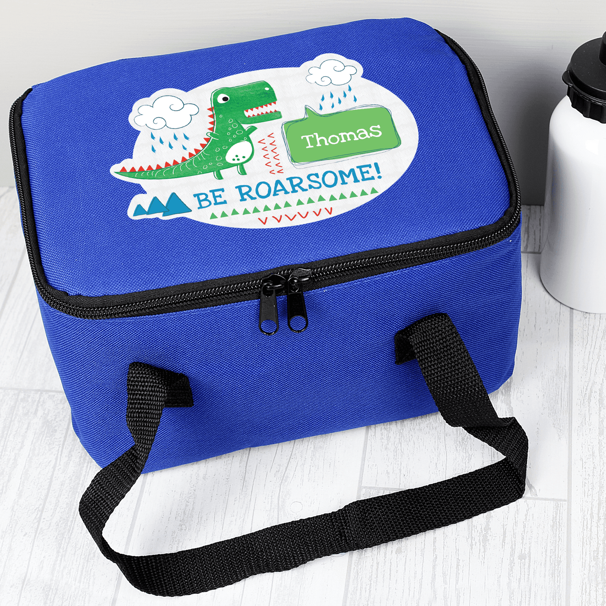 personalised blue dinosaur packed lunch bag with any name on top