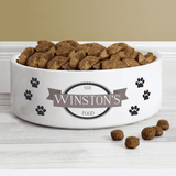 Personalised ceramic pet bowl with pawprints and a message over 3 lines