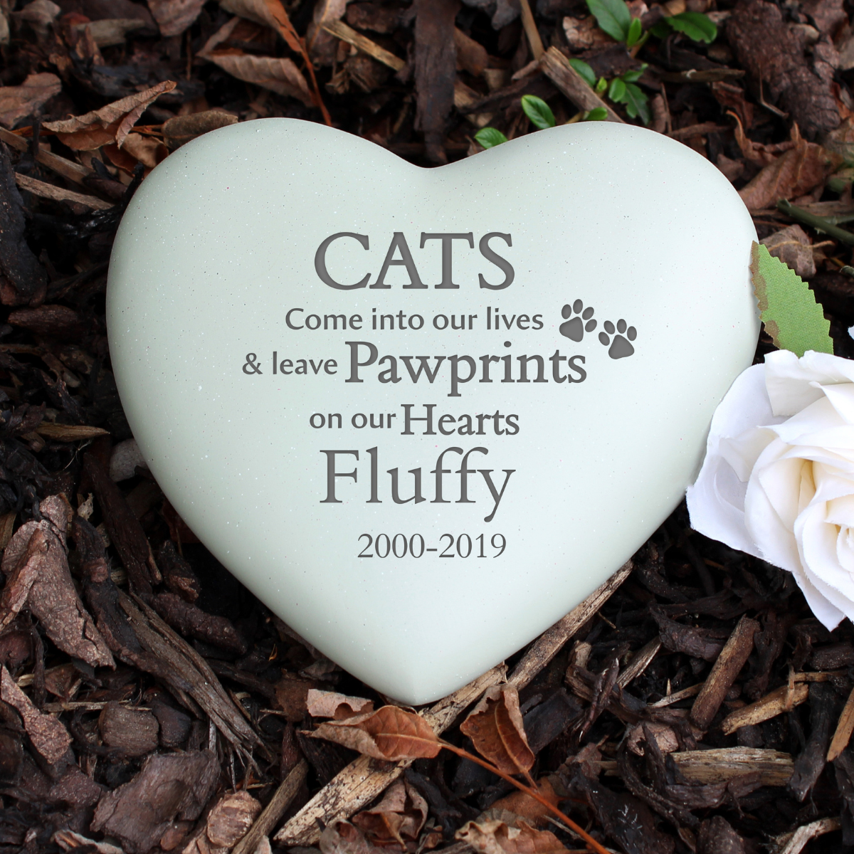 personalised cat memorial stone showing it engraved with the cat's name and their dates