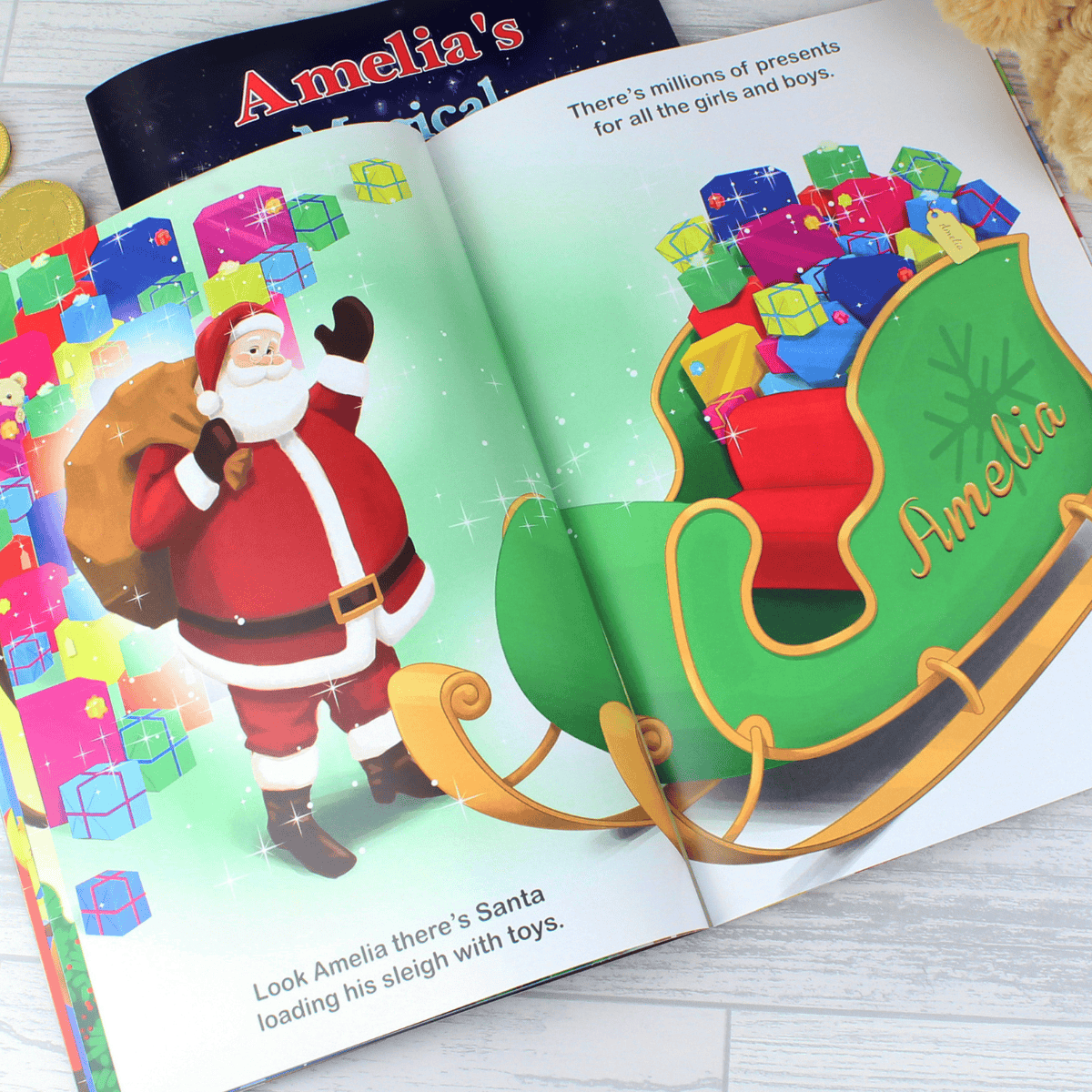 personalised christma story book showing the pages illustrated inside