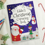 personalised christmas colouring book showing the front cover and the child's name personalised on it