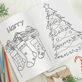 personalised children's colouring book showing the inside of the book personalised with the child's name