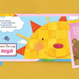 hello world personalised book showing the inside of the book with the child's name personalised on it
