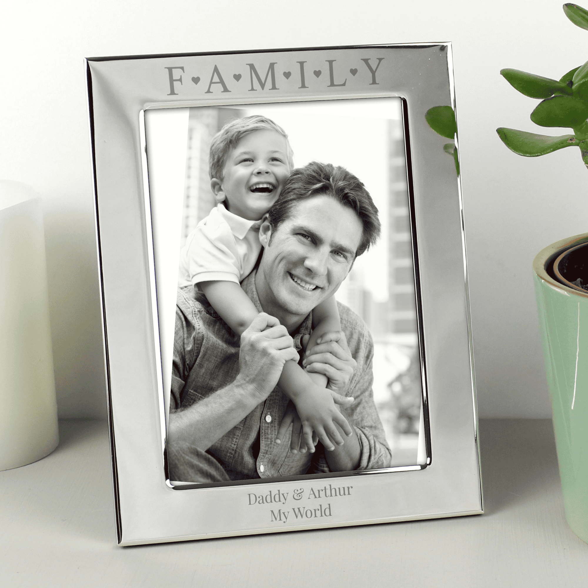personalised family photo frame engraved with a message over 2 lines under the photo