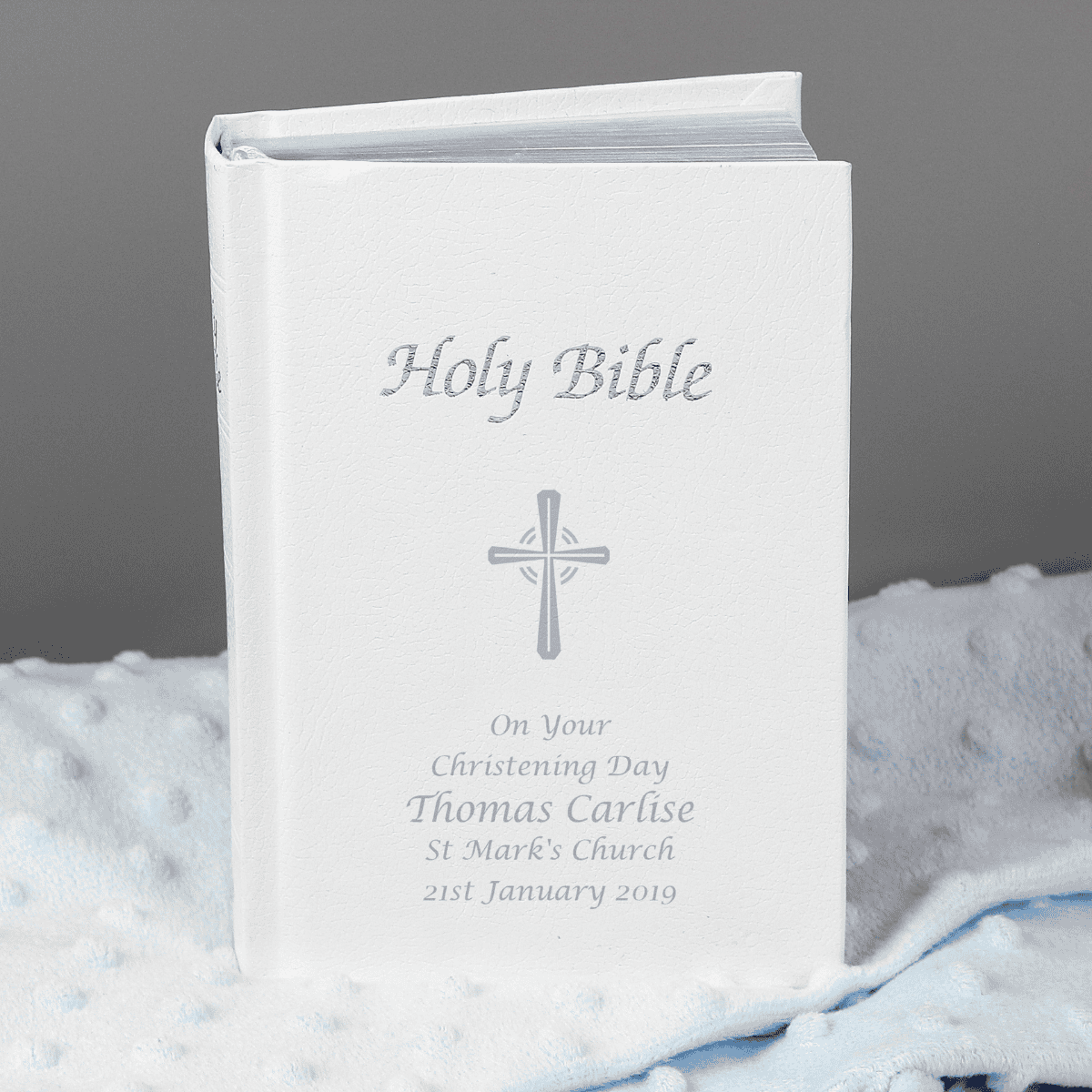 personalised holy bible with a silver cross on the front and 5 lines of personalisation underneath