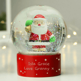personalised santa snow globe showing the personalisation on the front