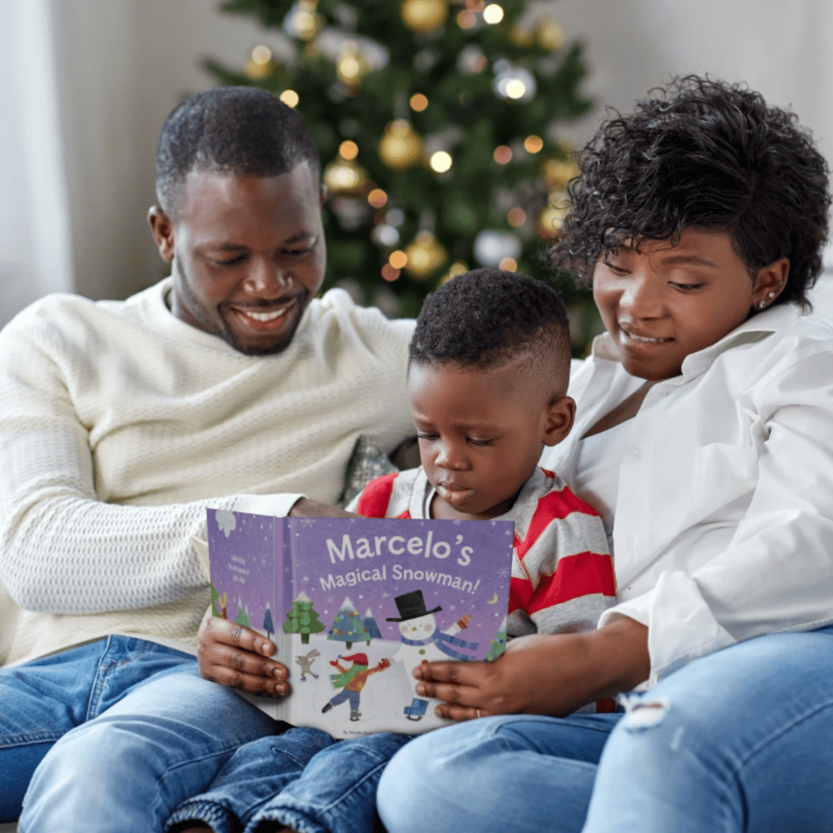 family reading the personalised magical snowman book together