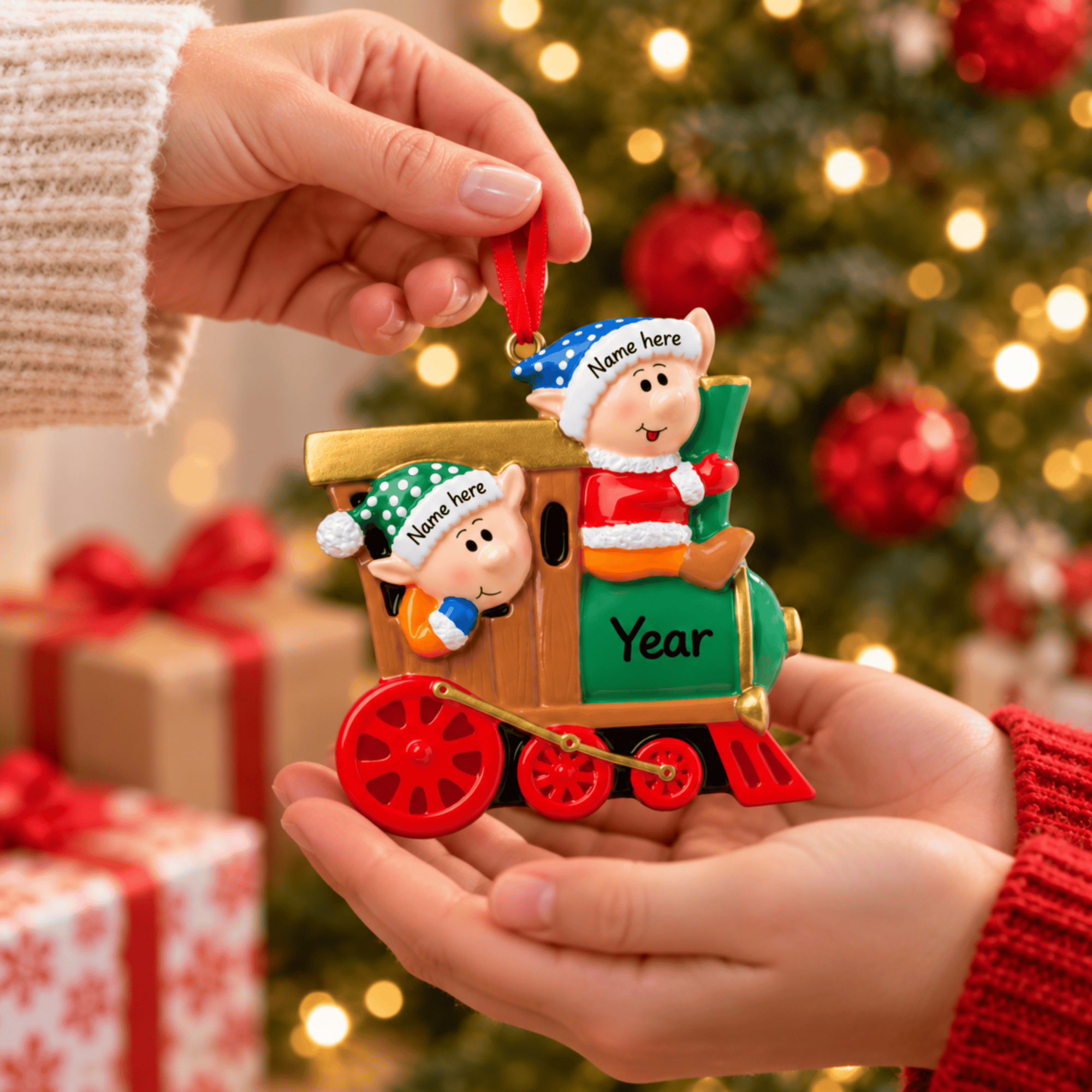 personalised elves on train christmas tree decoration names are hand personalised on the hats and the year on the train