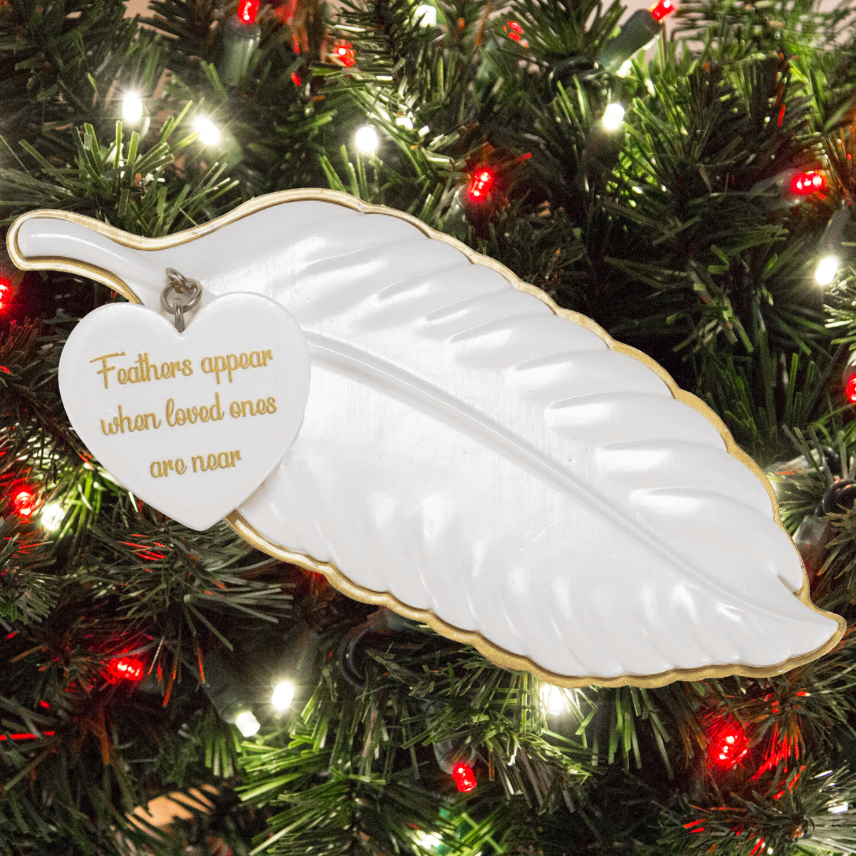 personalised white feather hanging decoration showing the message on the heart