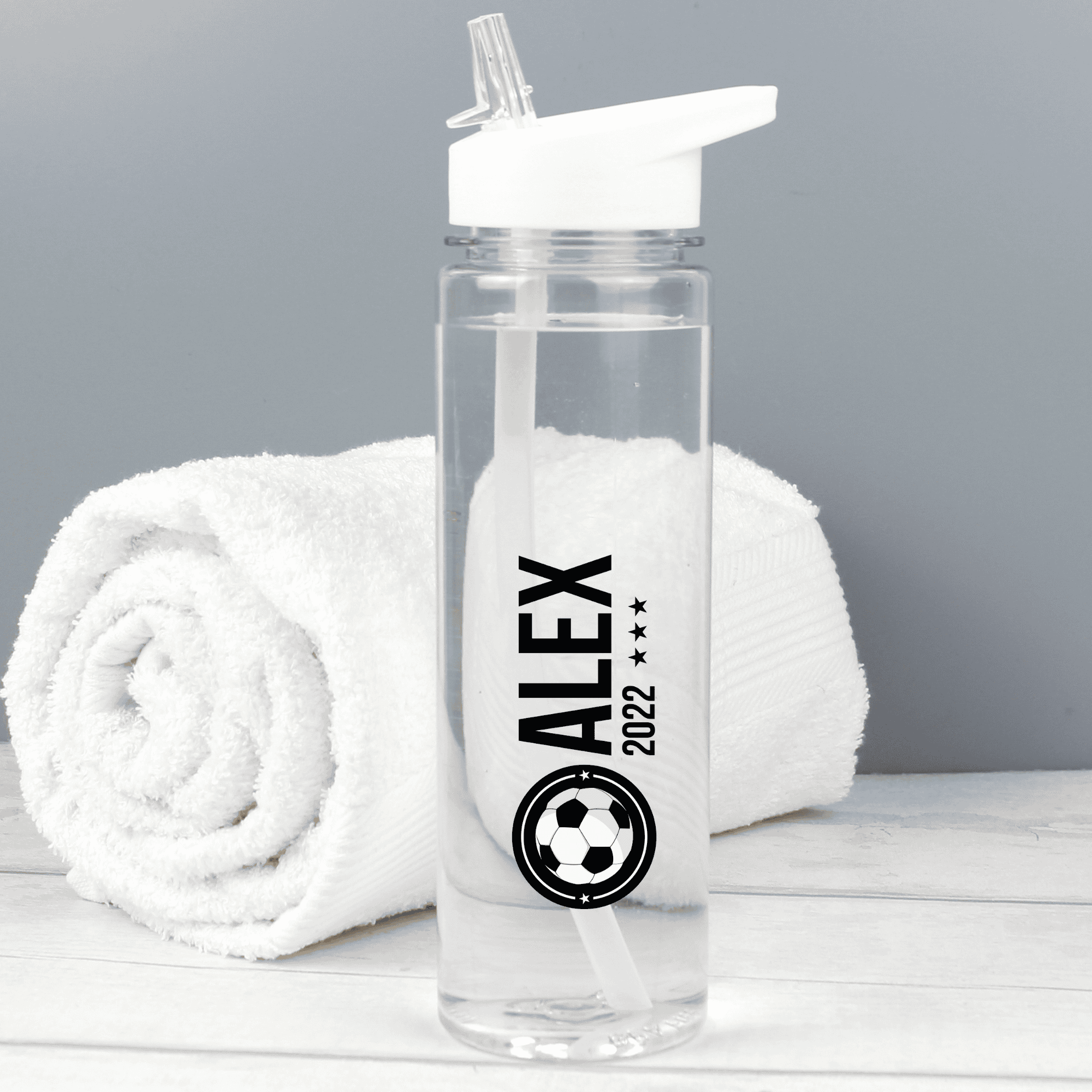 personalised football badge water bottle with any name and year on the front of the bottle