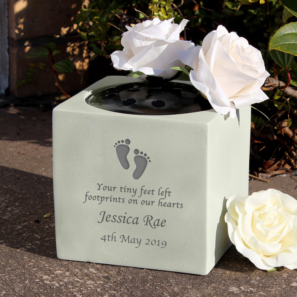 personalised memorial footprint vase with the baby's name and date engraved on the front