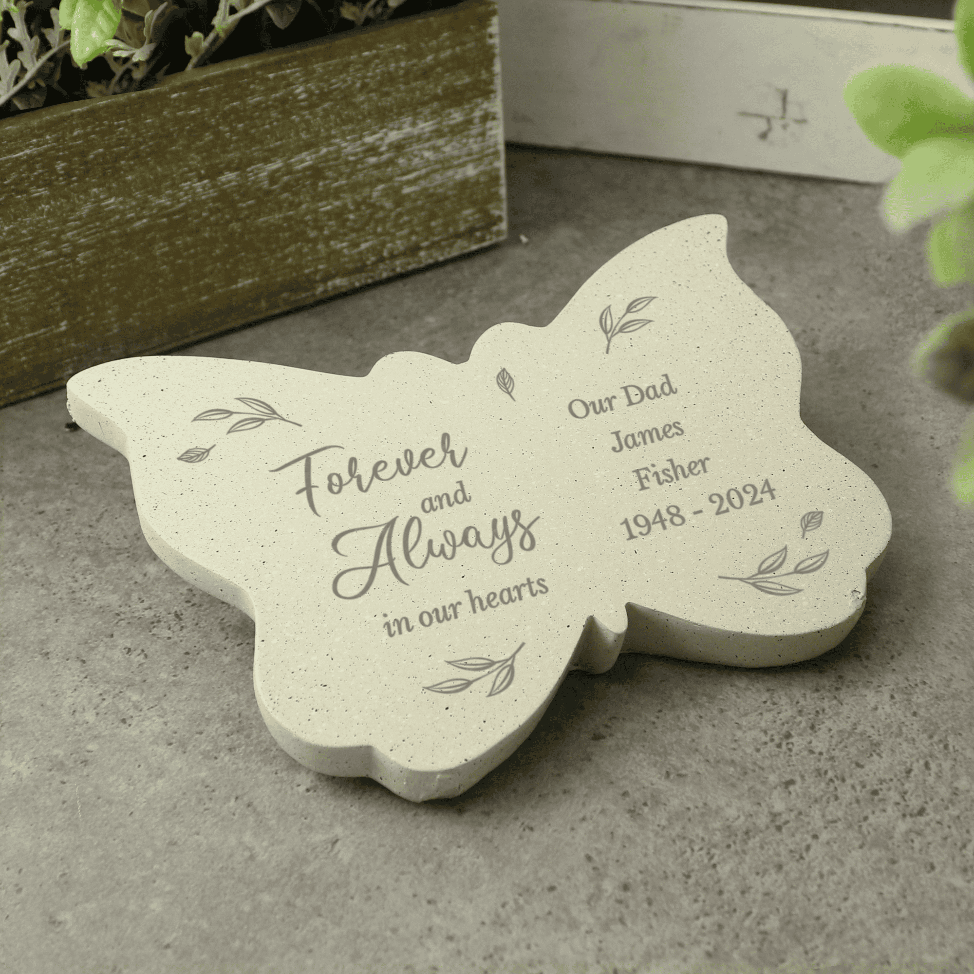 butterfly memorial stone with  the message forever and always in our hearts on the left wing and any message engraved over 4 lines on the right wing
