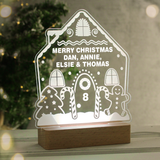 personalised gingerbread LED house showing it lit up in white
