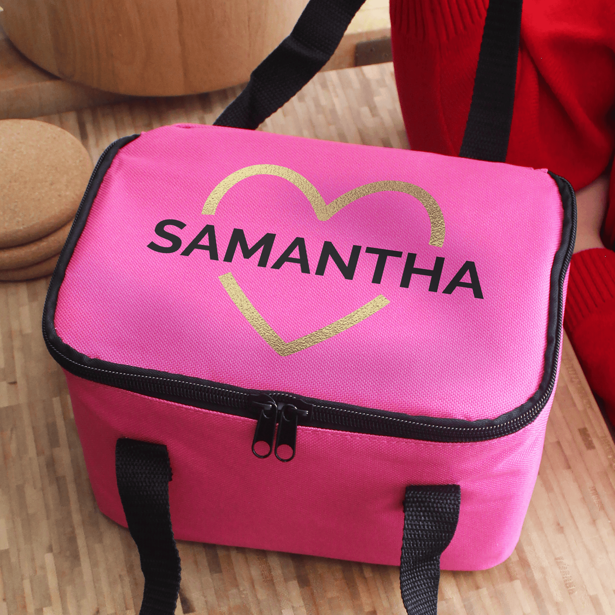 personalised pink packed lunch box with a gold heart and any name personalised on the top