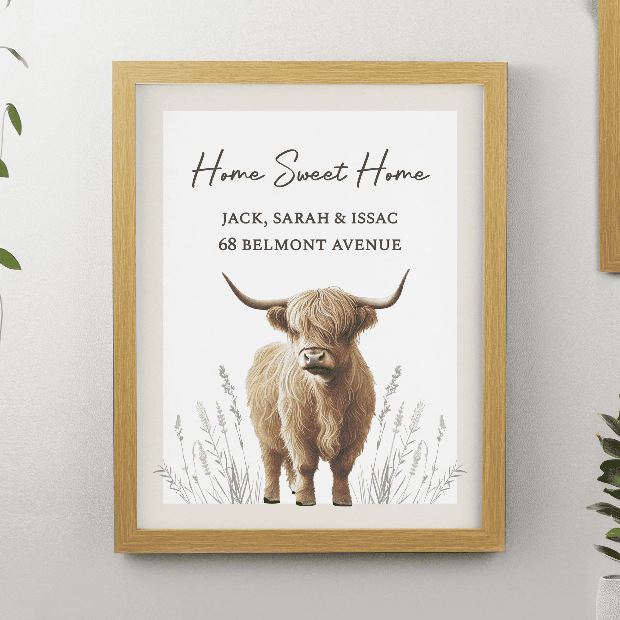 personalised highland cow framed print personalised over 3 lines above the highland cow image