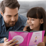 A man and child reading the personalised book I'm a little dancer together