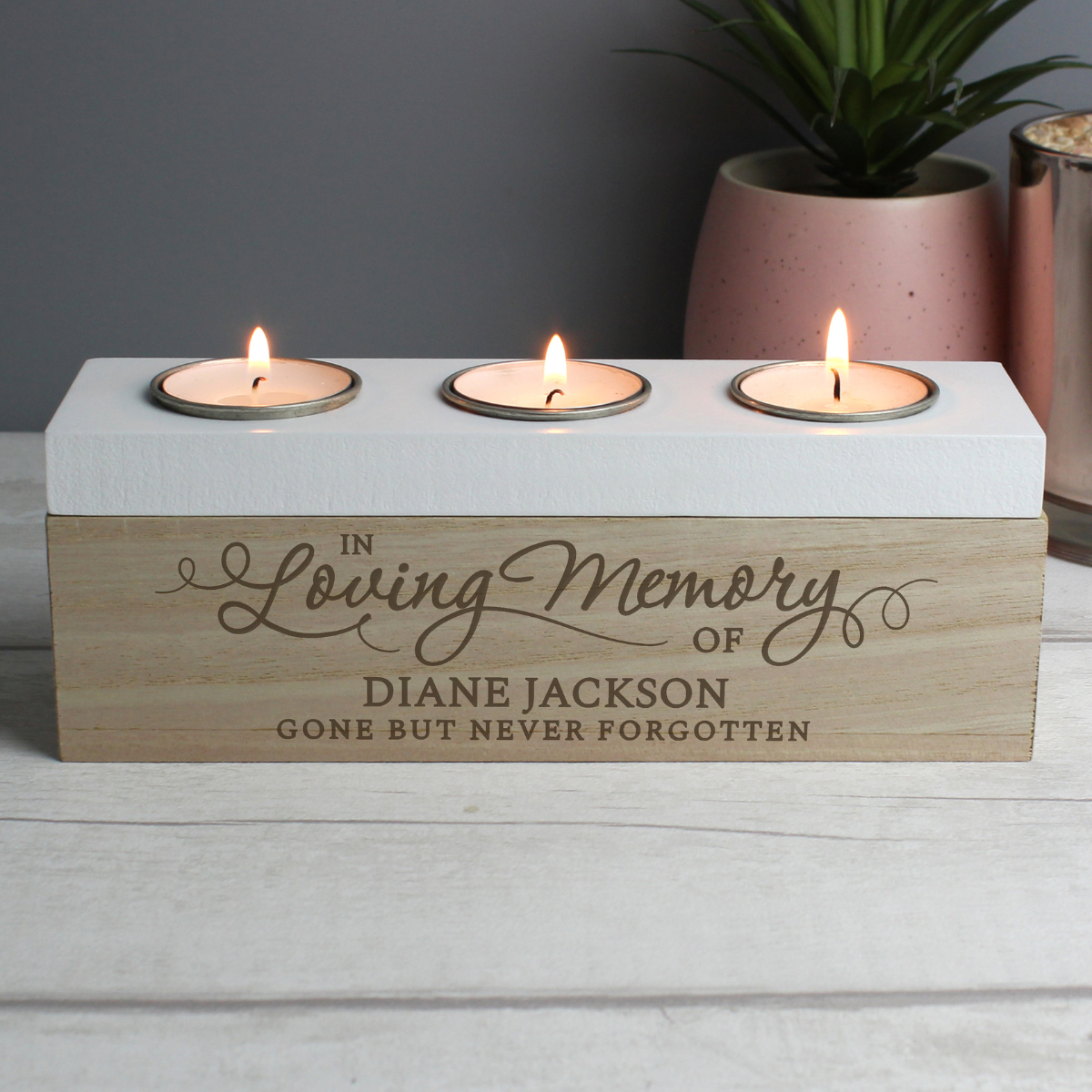 personalised wooden memorial tealight holder showing the engraving on the side
