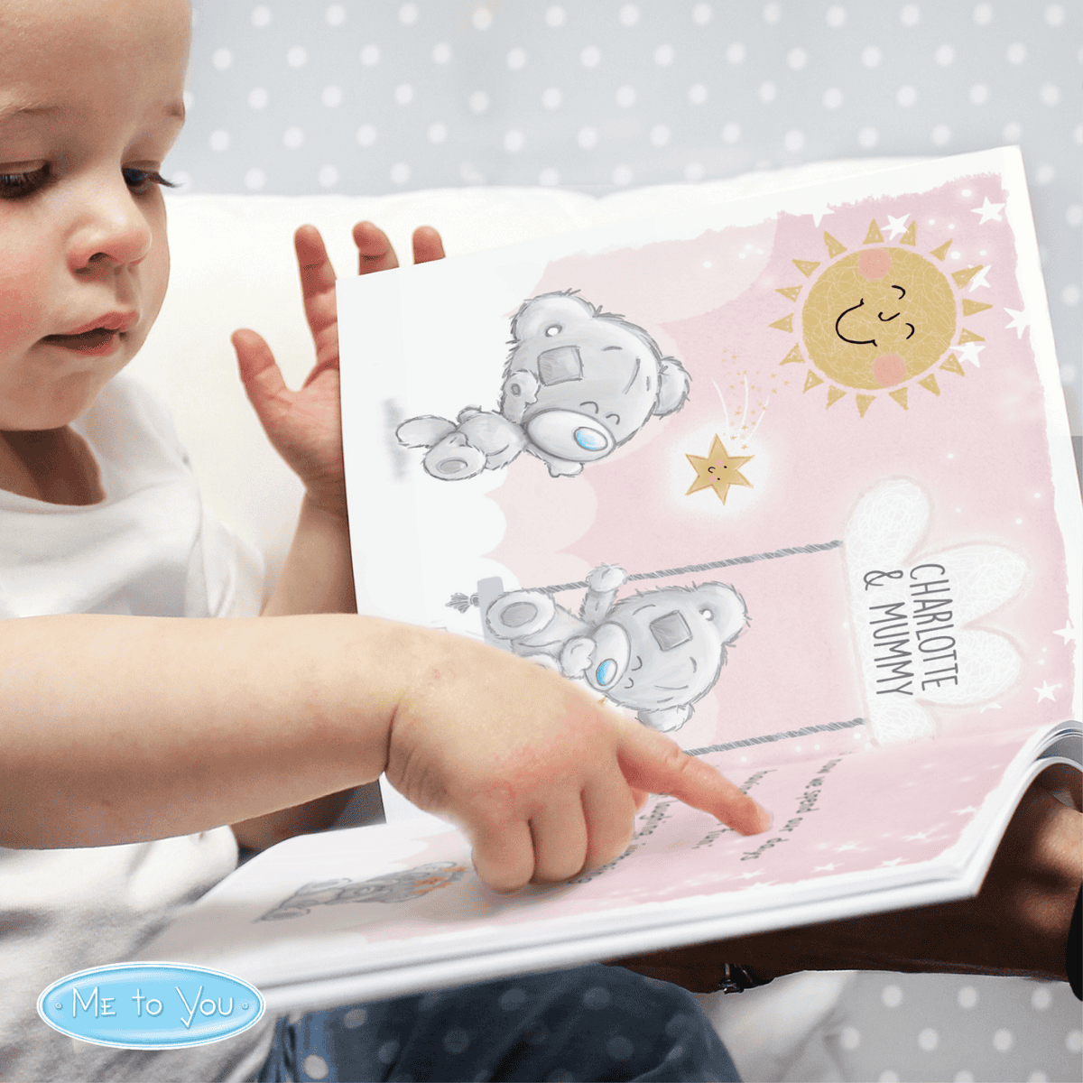 personalised mummy poem book showing illustrations on the inside of the book with a toddler pointing to their name