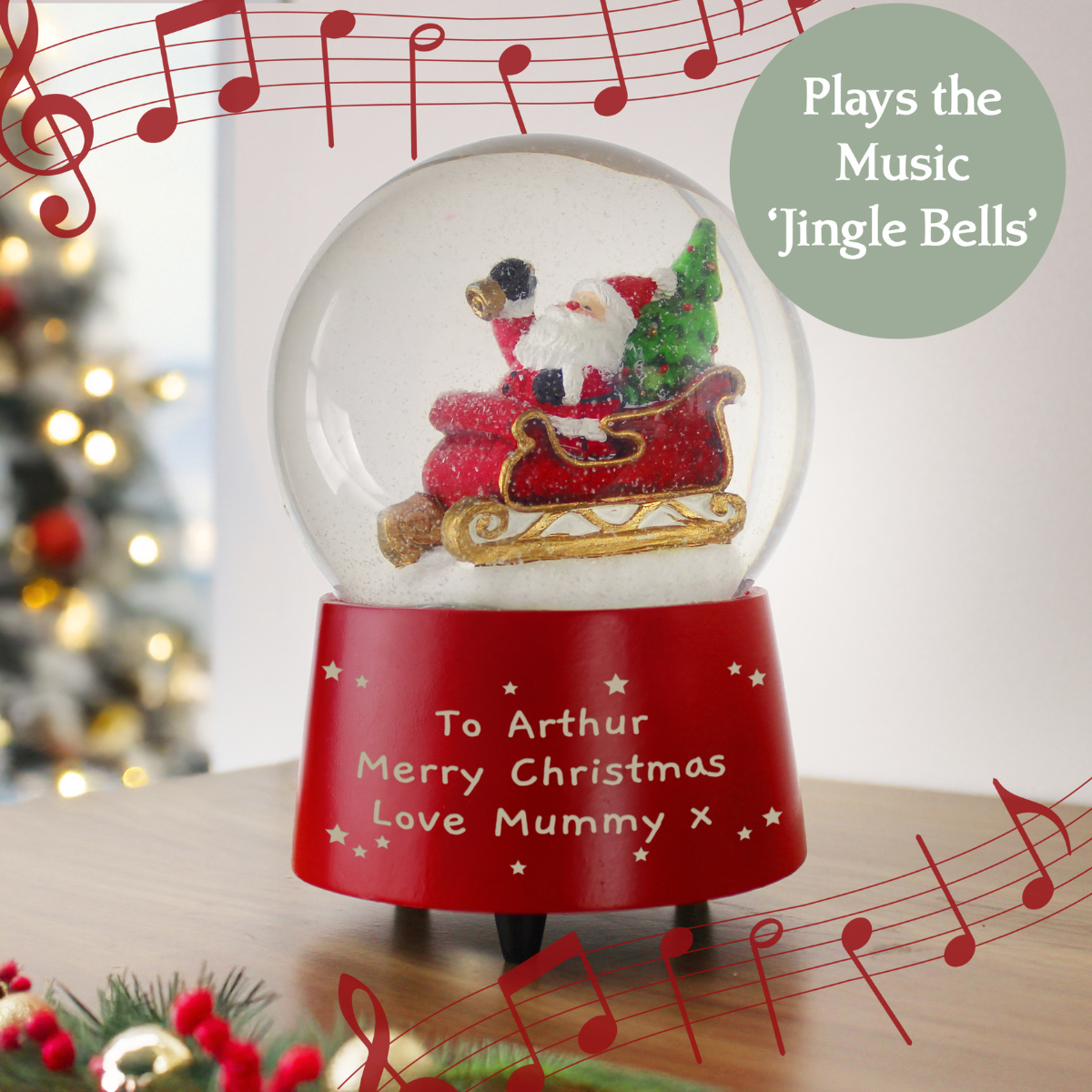 personalised musical snow globe showing that it can be personalised with any message over 3 lines.