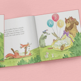 personalised new cutie in town showing the inside of the book with the illustrations and the child's name personalised on the pages
