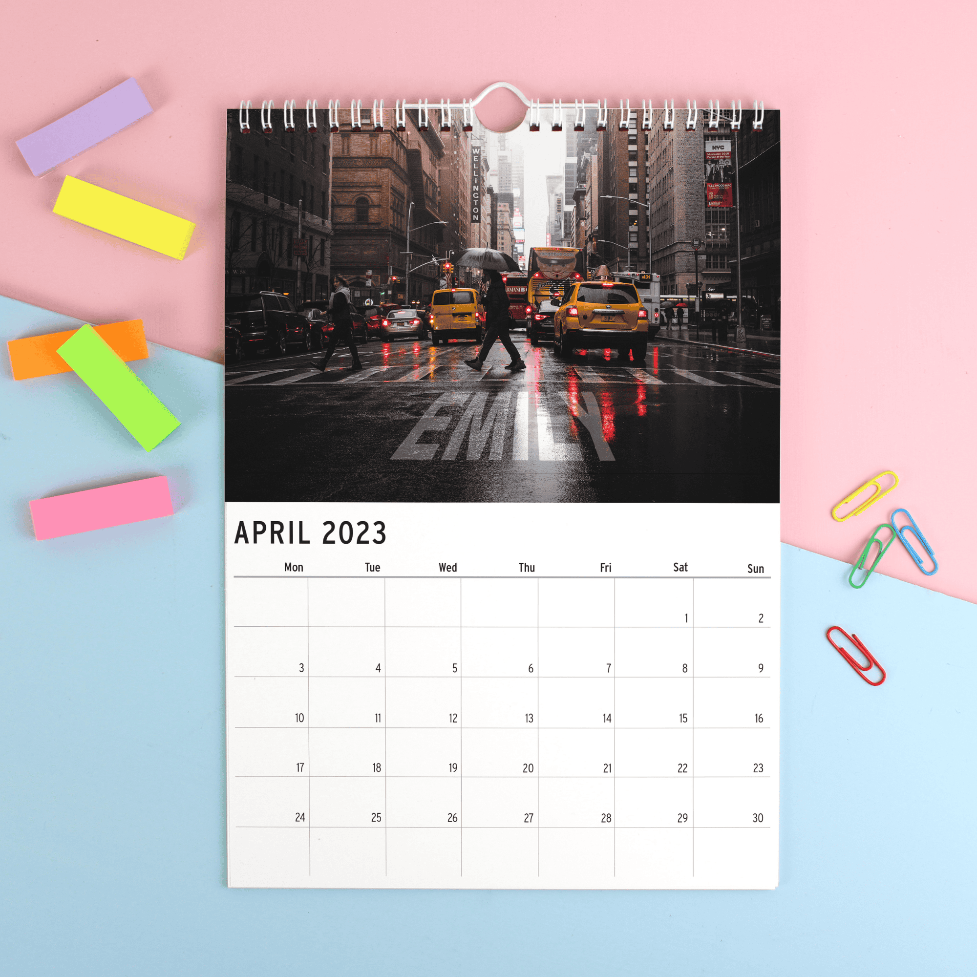 personalised a4 wall calendar of new york with the person's name on every page