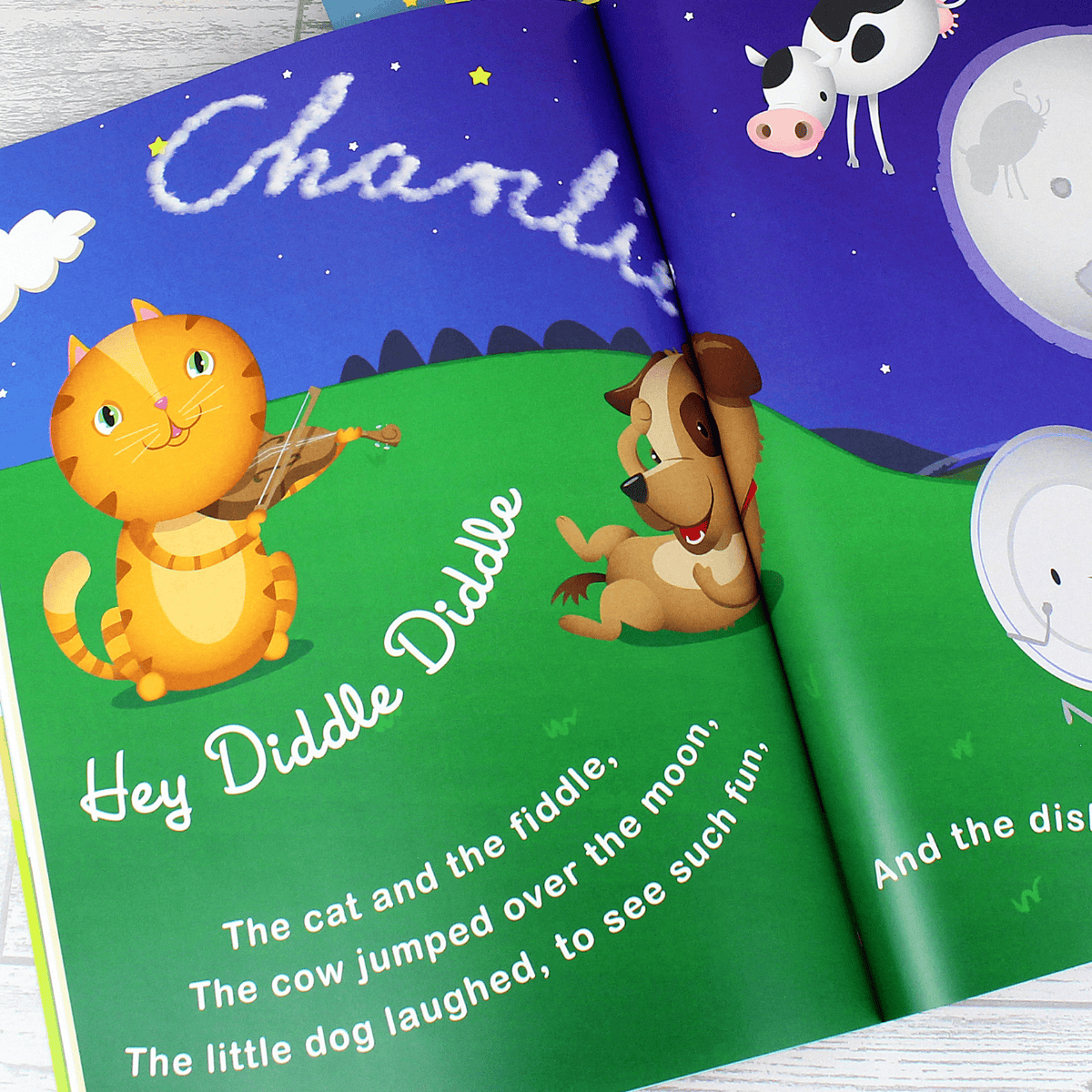 personalised children's nursery rhyme book showing an inside page with the child's name personalised on it