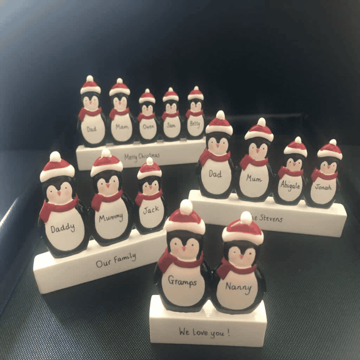 personalised penguin mantle collage showing the various designs