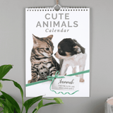 personallised a4 wall calendar of cute animals with the person's name featured in the picture for every month