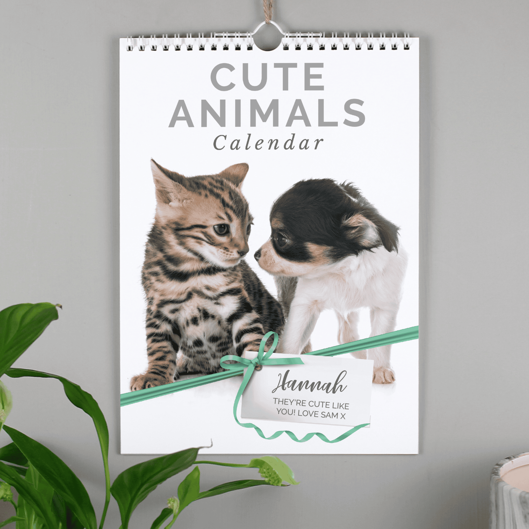personallised a4 wall calendar of cute animals with the person's name featured in the picture for every month