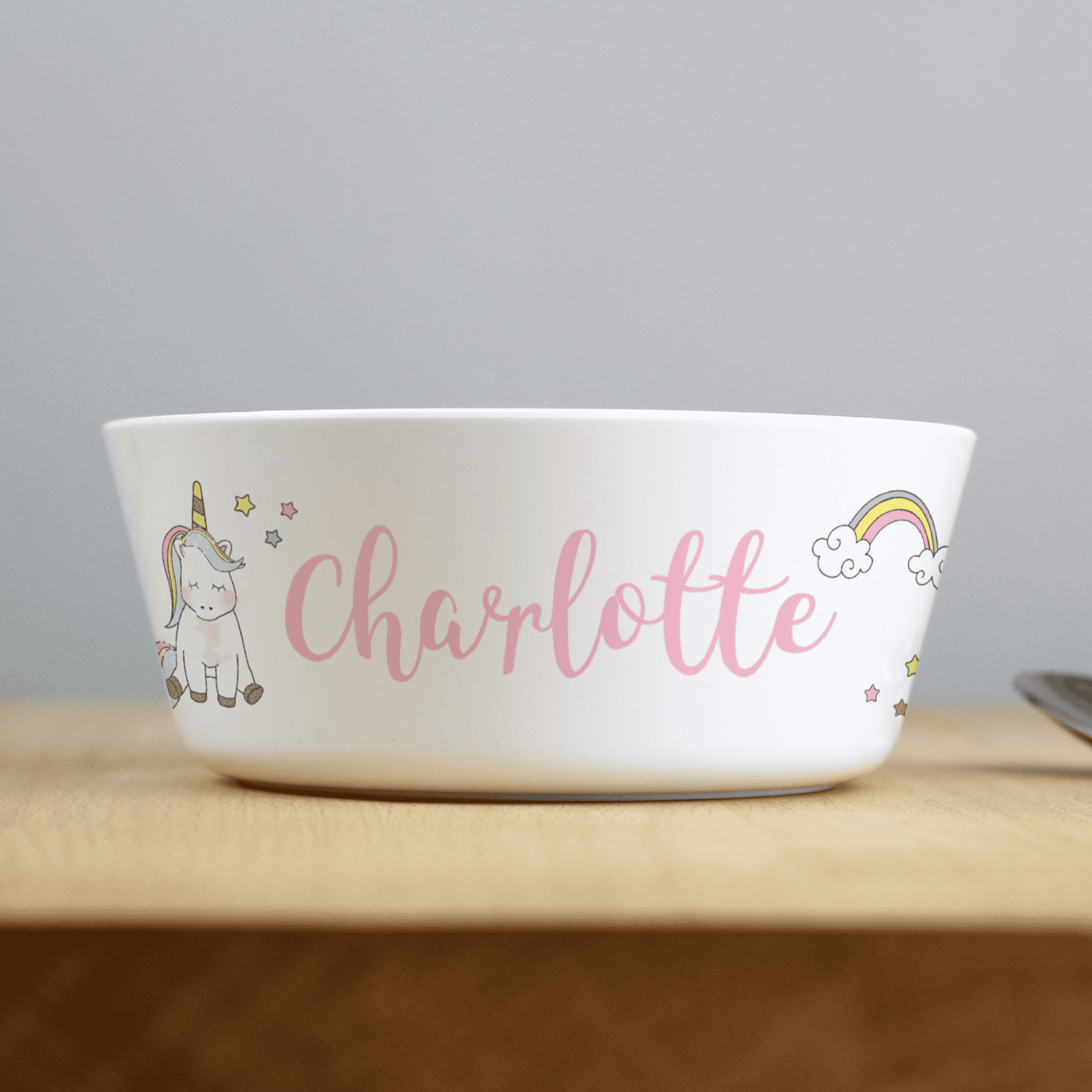 personalised baby unicorn plastic bowl with any name personalised on the side of the bowl 