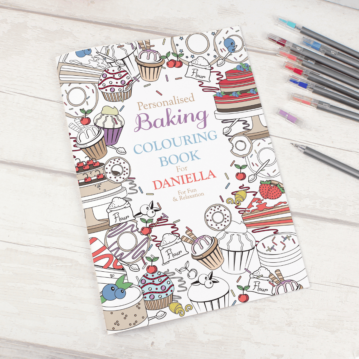 personalised colouring book with the name personalised on the front