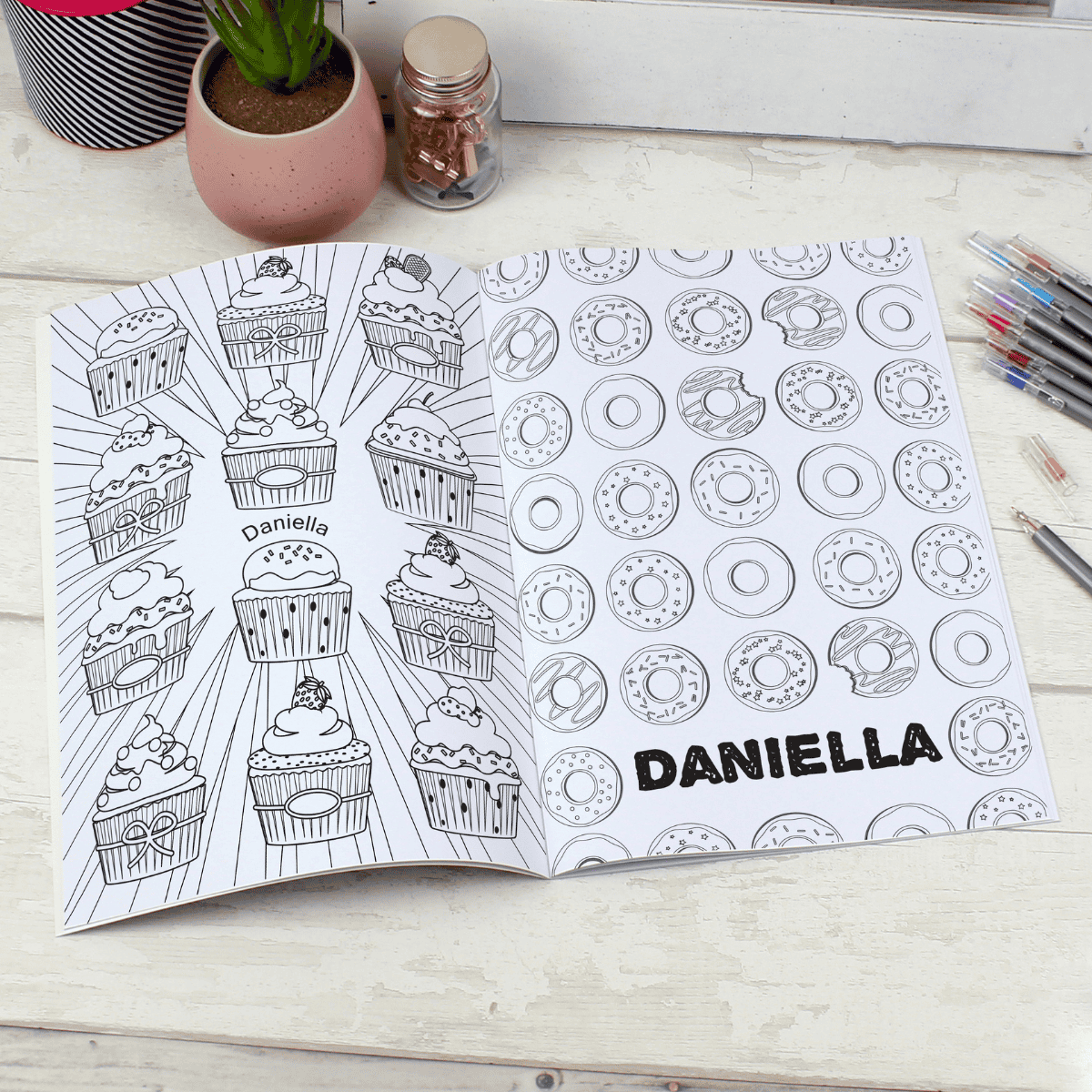 personalised colouring book showing the inside of the book with the chosen name personalised on every page