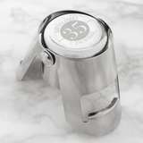 personalised metal bottle stopper that can be engraved with a year and a message above and below it