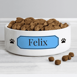 personalised ceramic pet bowl with any name on a blue plaque.