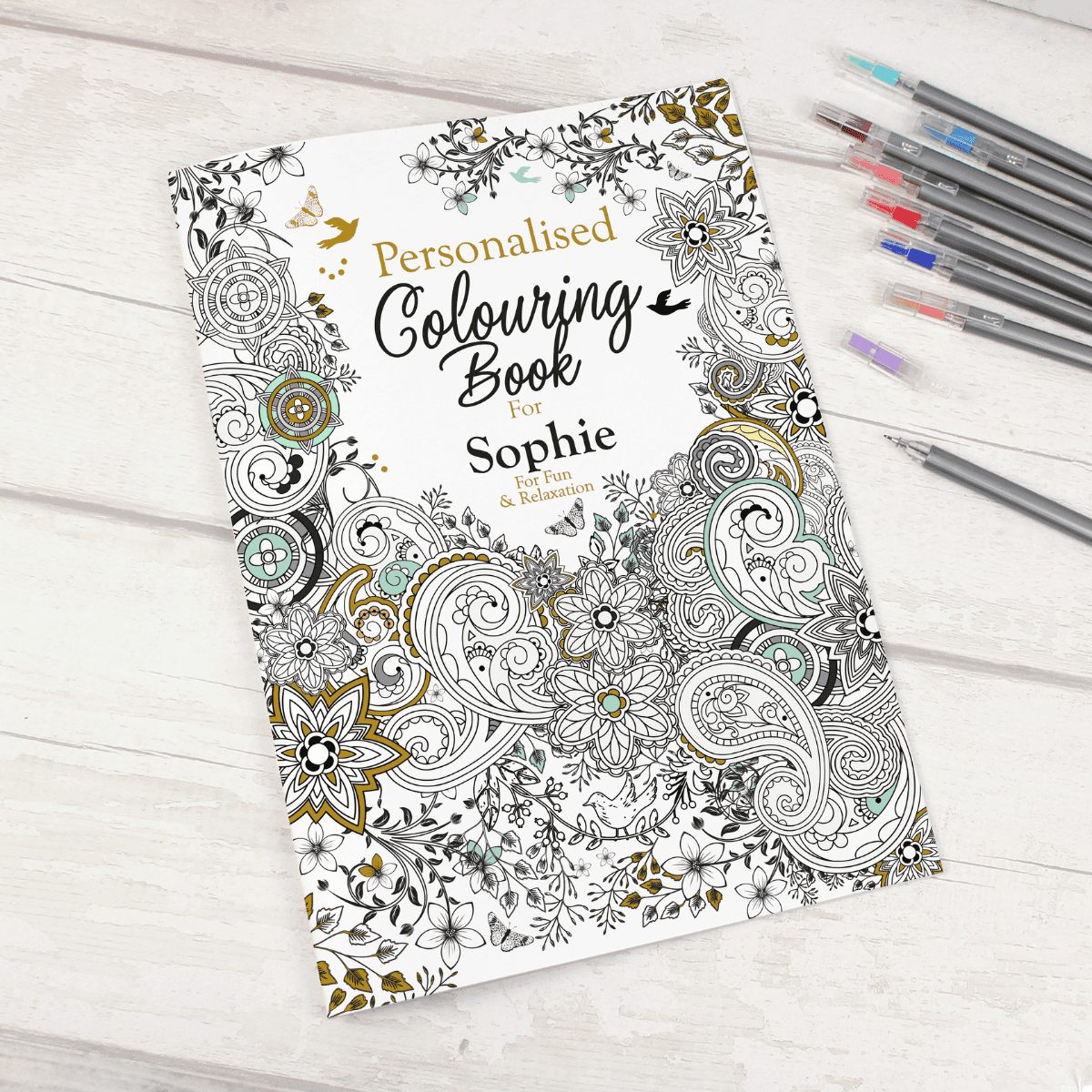 personalised colouring book with the name personalised on the front