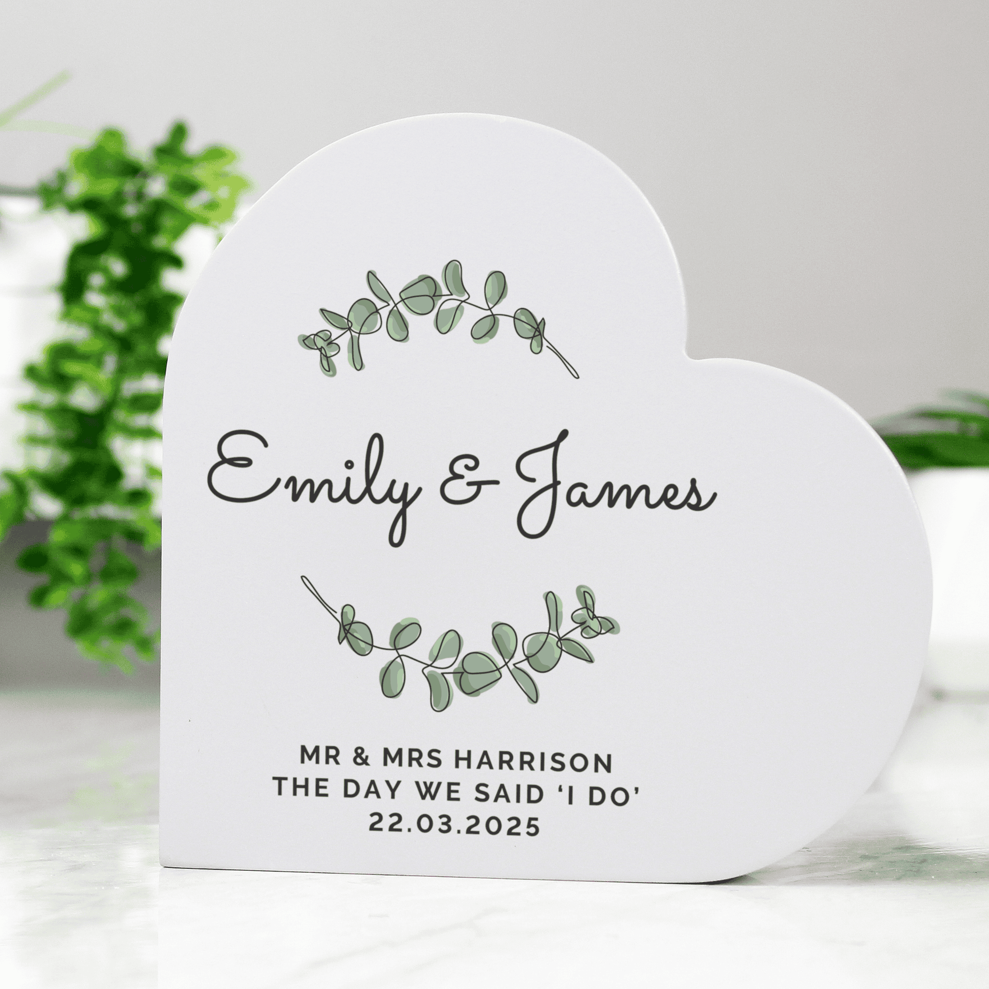 personalised botanical wooden heart personalised with names and a message over 3 lines