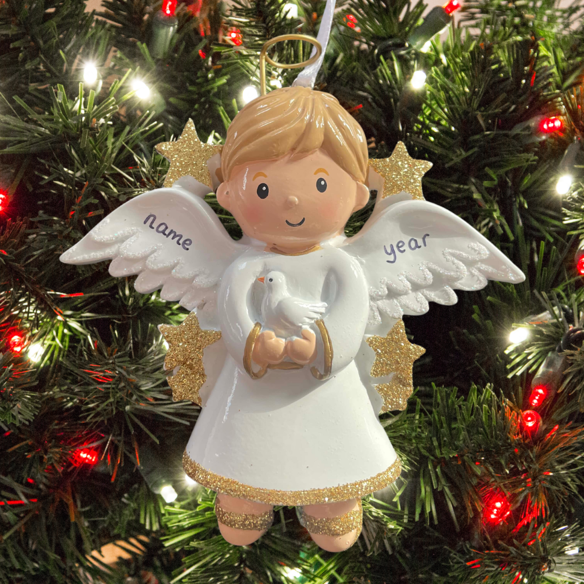 personalised angel boy christmas tree decoration on a christmas background