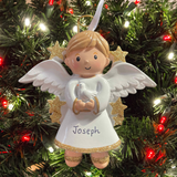 personalised angel boy christmas tree decoration on a christmas background