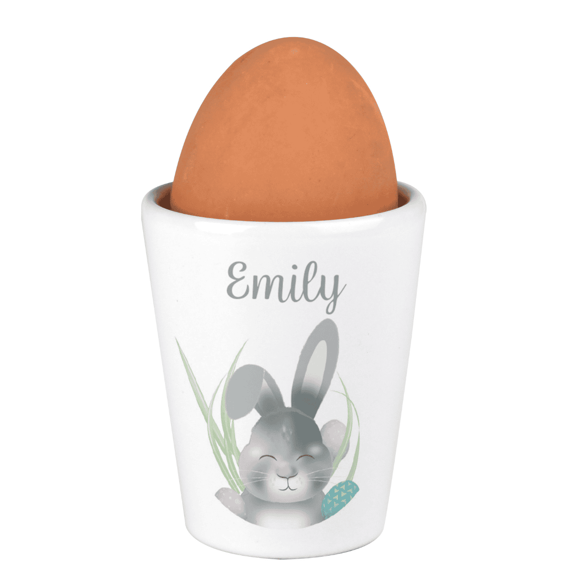 white ceramic easter bunny egg cup showing the personalisation on the front above the bunny design