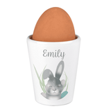 white ceramic easter bunny egg cup showing the personalisation on the front above the bunny design